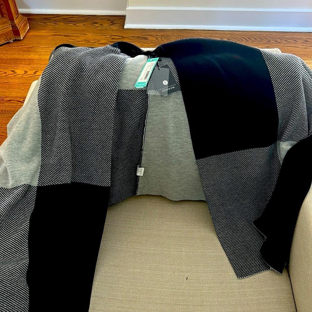 Size large black cardigan open faced.